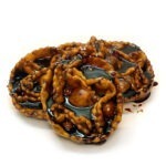 antica-ricetta-di-puglia-prodotti-tipici-regionali-prodotti_cartellate-artigianali-pugliesi-al-vino-cotto-fatte-a-mano